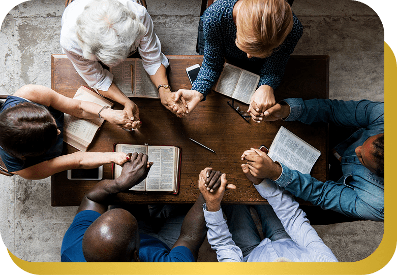 Diverse group in prayer circle