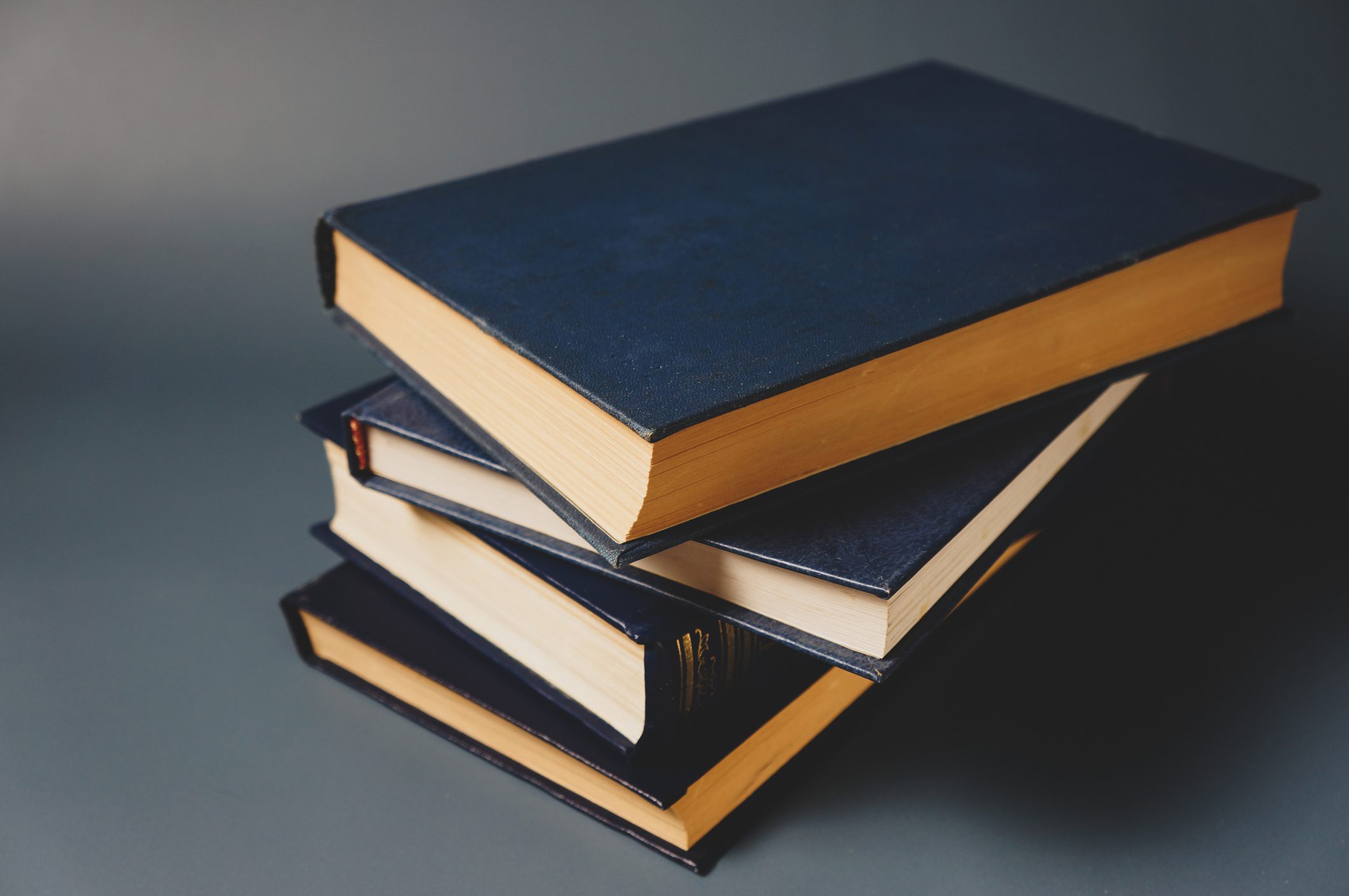 a composition of many hardcover books, a concept of reading and education, copy space